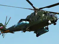 В России снаряд из вертолета врезался в стену жилого дома (ФОТО)