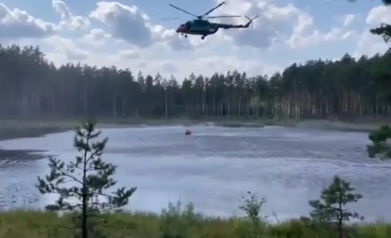 В результате пожара в Гаркалне выгорел 21 гектар леса: тушили с вертолета (ВИДЕО)