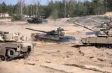 На полигоне в Адажи итальянская БМП открыла огонь по своим: ранены четверо военных