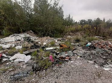 Десятки лет на свалке: под Петербургом на мусорном полигоне живут целые коммуны